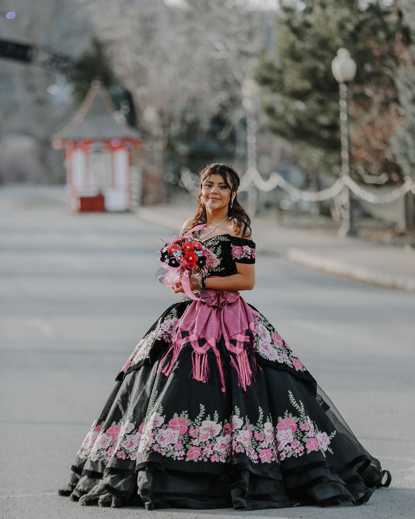 Quinceañera in charro-style dress