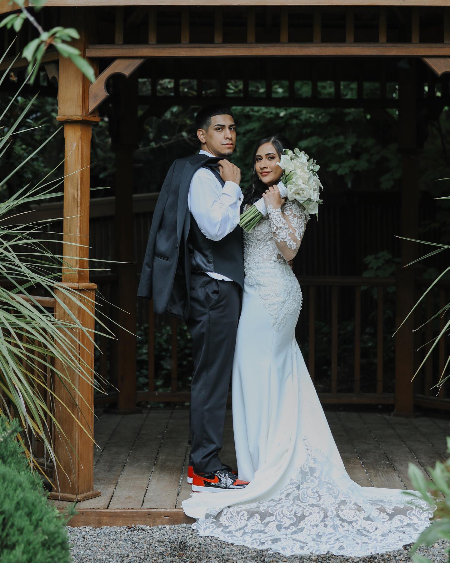 Bride and groom portrait by MZ Photography