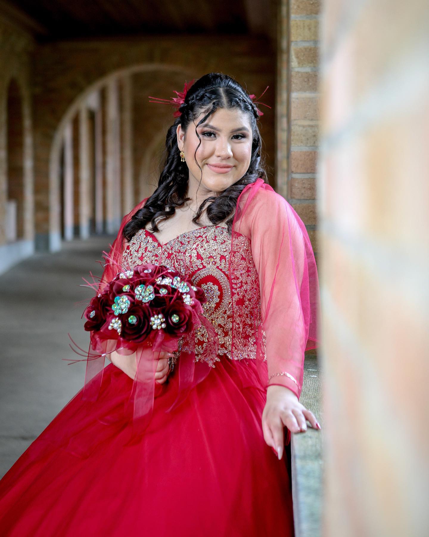 Quinceañera portrait in red dress by MZ Photography