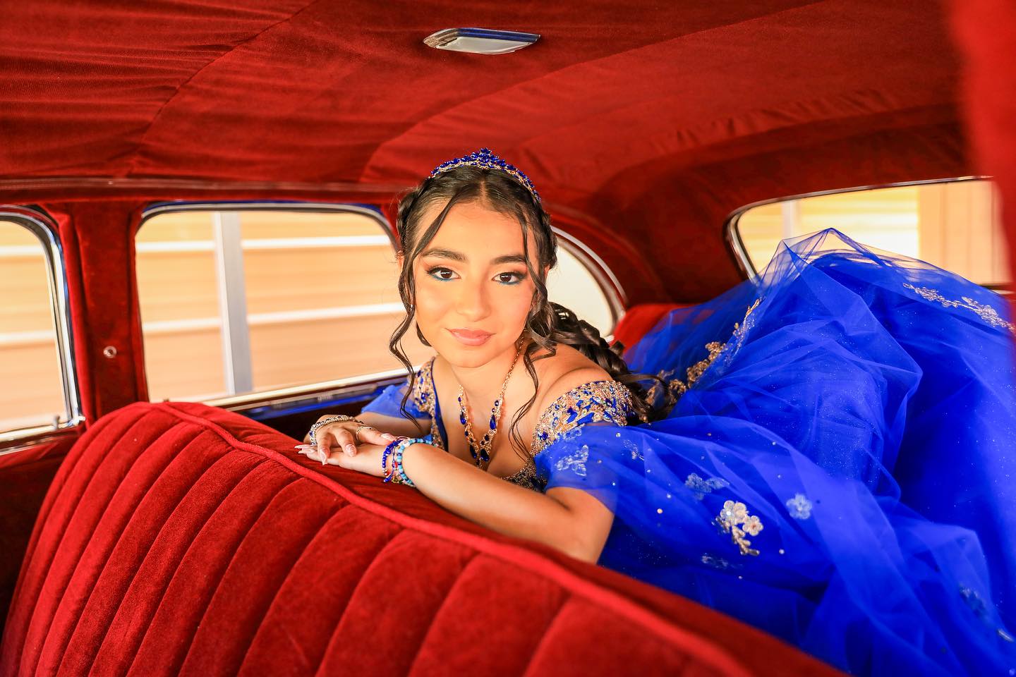 Quinceañera in a classic car